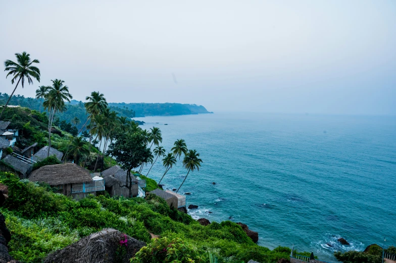 a view of a body of water next to some huts