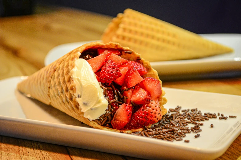 the waffle is filled with strawberries and bananas