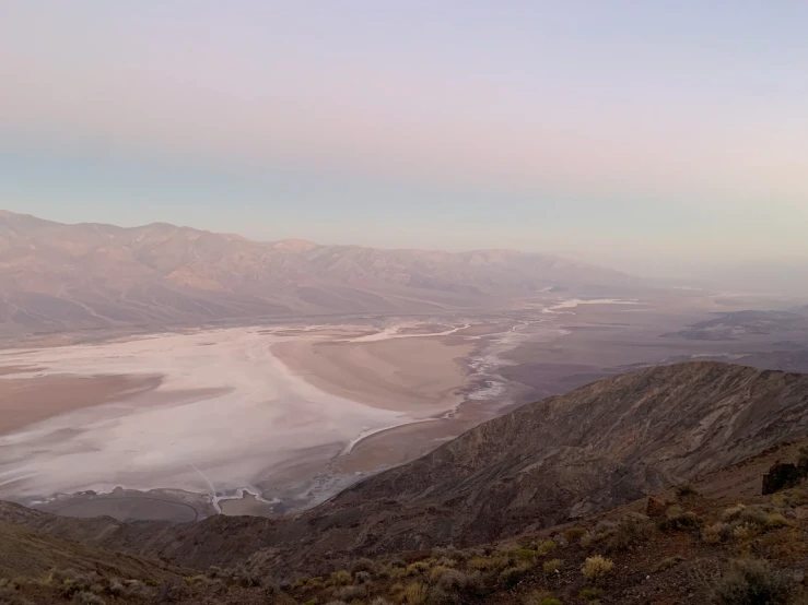 a large body of water surrounded by mountains