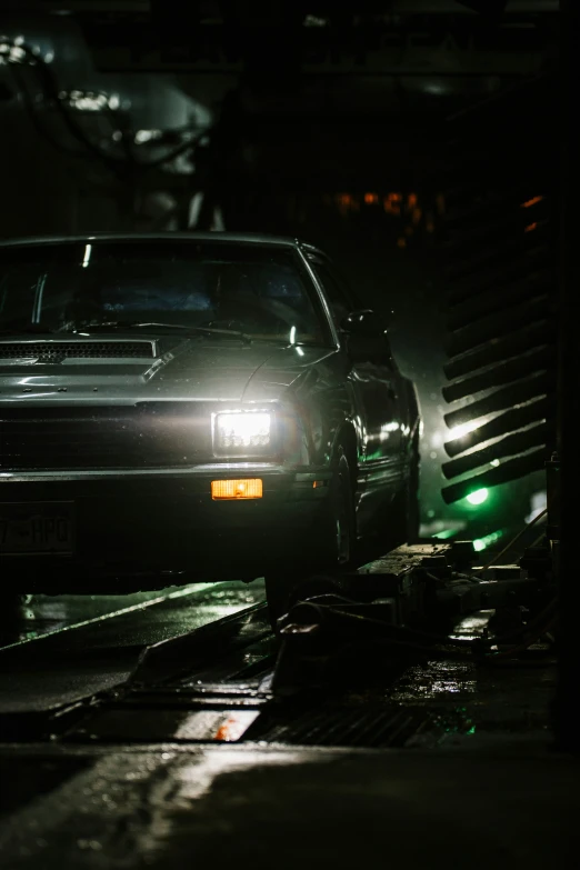 a vehicle parked in front of a large pile of junk