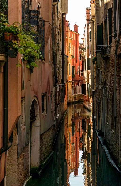 a canal running between two buildings on both sides