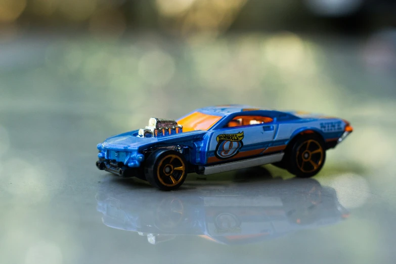 a toy car with a name plate on the side of it