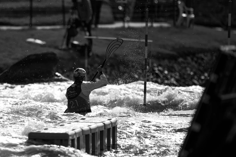 a person holding a paddle and holding soing