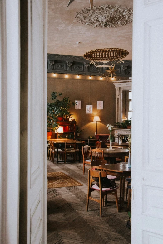 the interior of a resturant looking out the front door