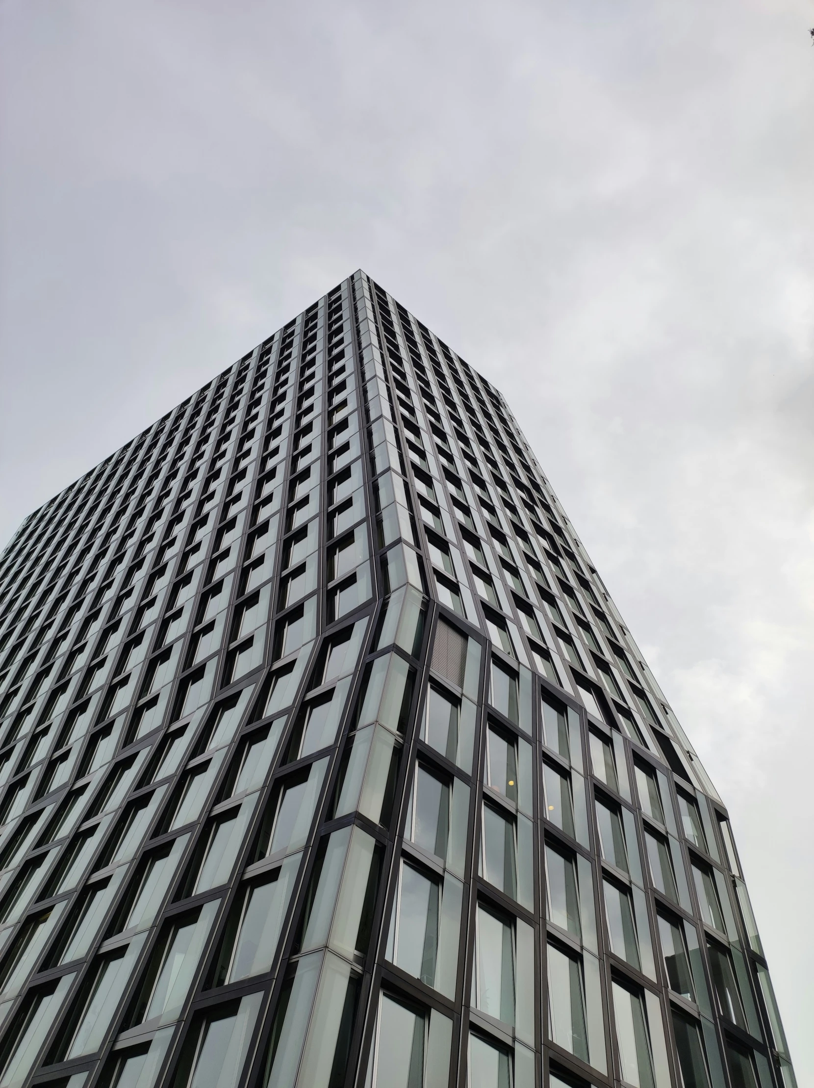 an upward view of a tall building