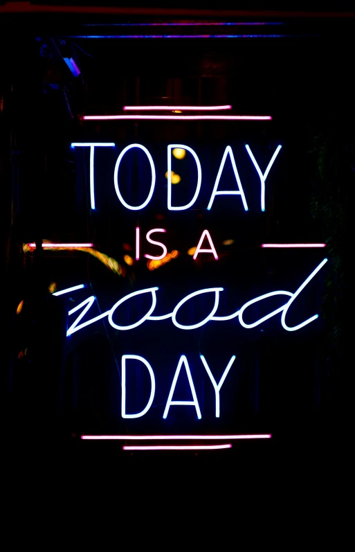 neon lights with a message saying today is a good day