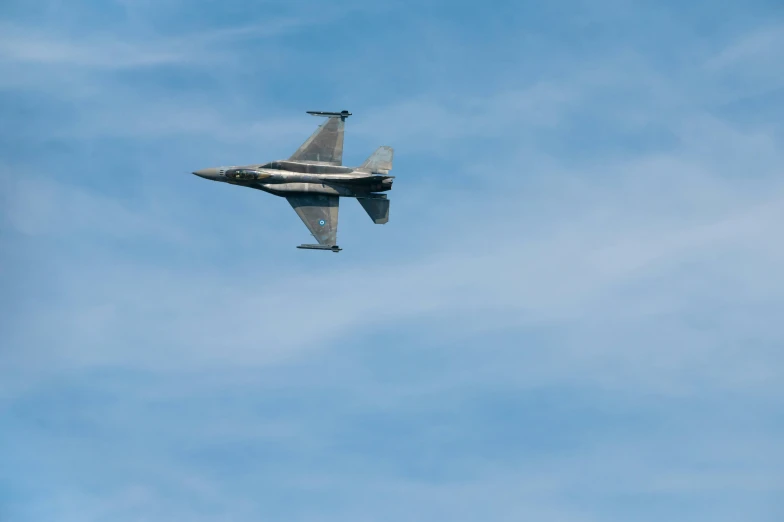 an airplane that is flying in the sky