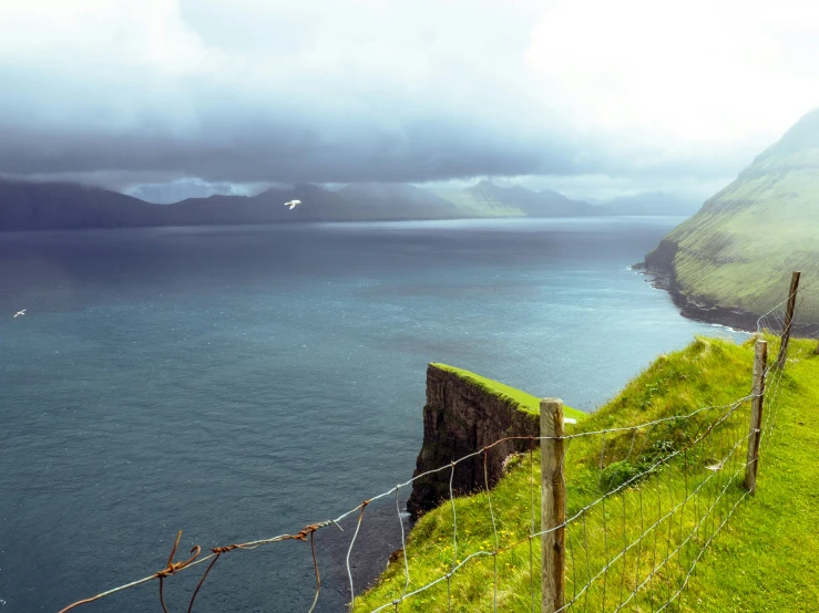 the hills along the ocean face the cliffs