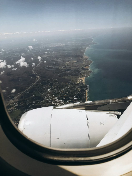 an airplane wing and the wing end of another plane