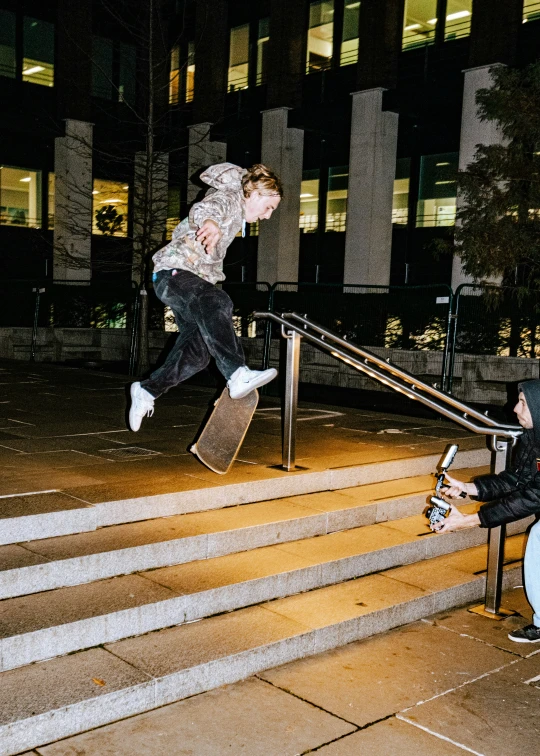 the young man is practicing his skateboarding ss