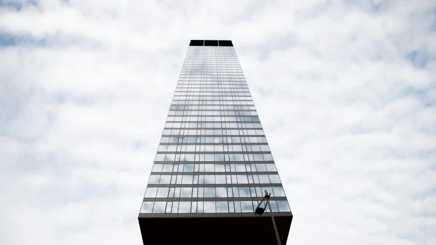 a very tall building with several windows on top of it