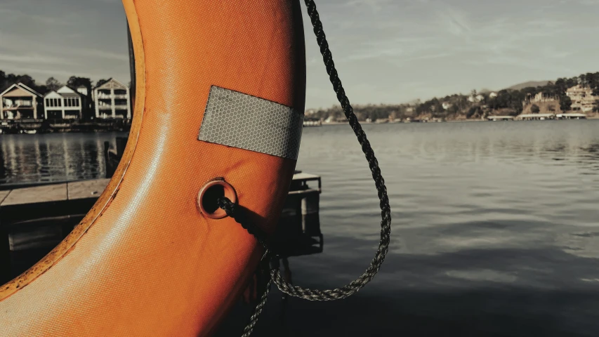 a life jacket rests on the front of a boat