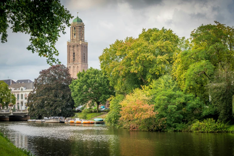 a view of a lake near a tall building