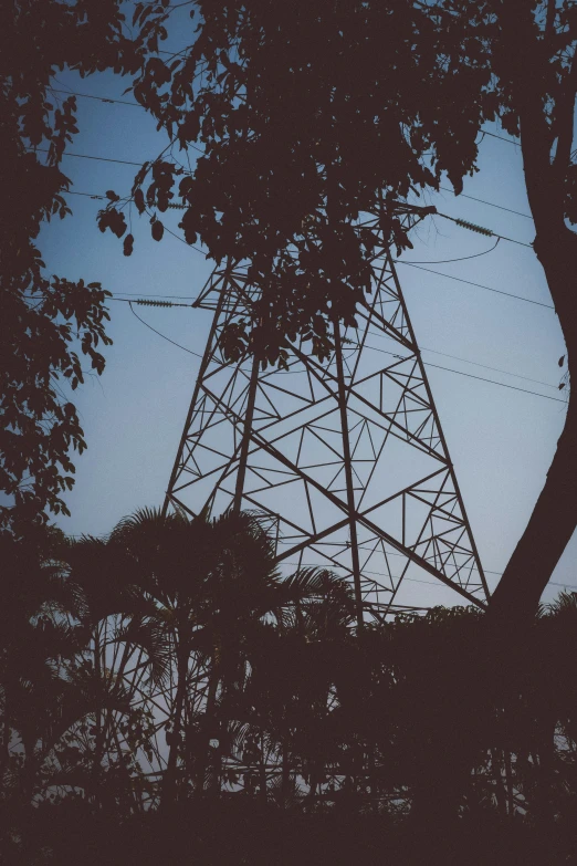 an image of a tall tower with many wires