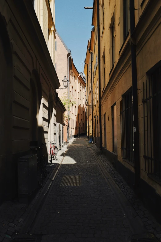 a street with a bench and several building