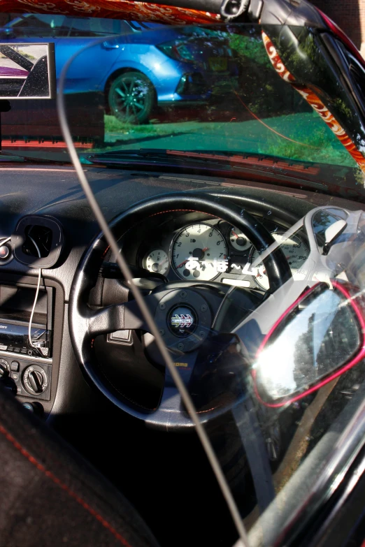 a car inside has the interior and the dashboard visible