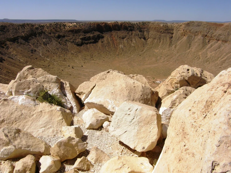 rocks with a large hill in the background