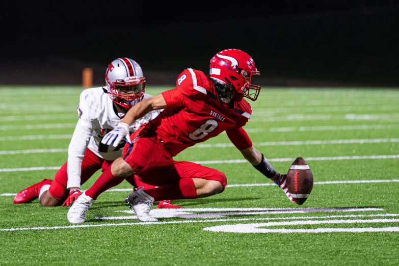 an athlete attempts to break by during the football game