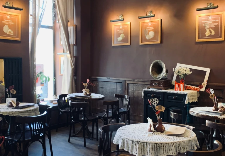 an elegant restaurant has brown walls and chairs