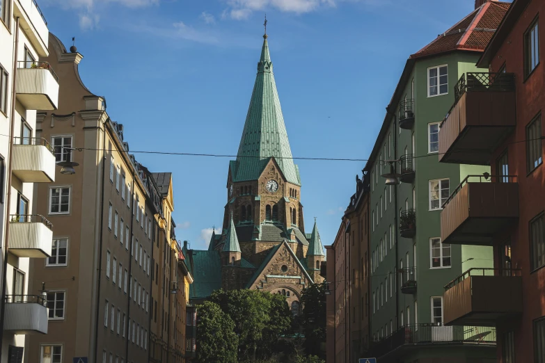 buildings along a street with a spire in the center