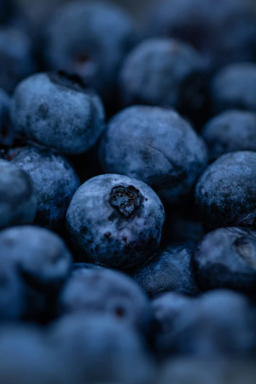 a group of berries that are sitting together