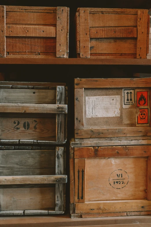 several drawers that are holding mail boxes and wood crates