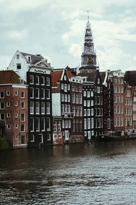 some very pretty tall buildings by the water