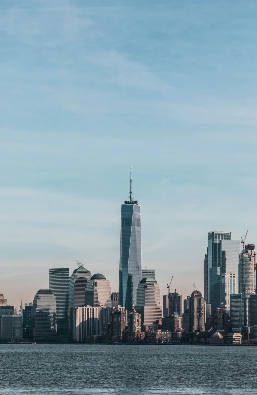 a large city with very tall buildings near the water