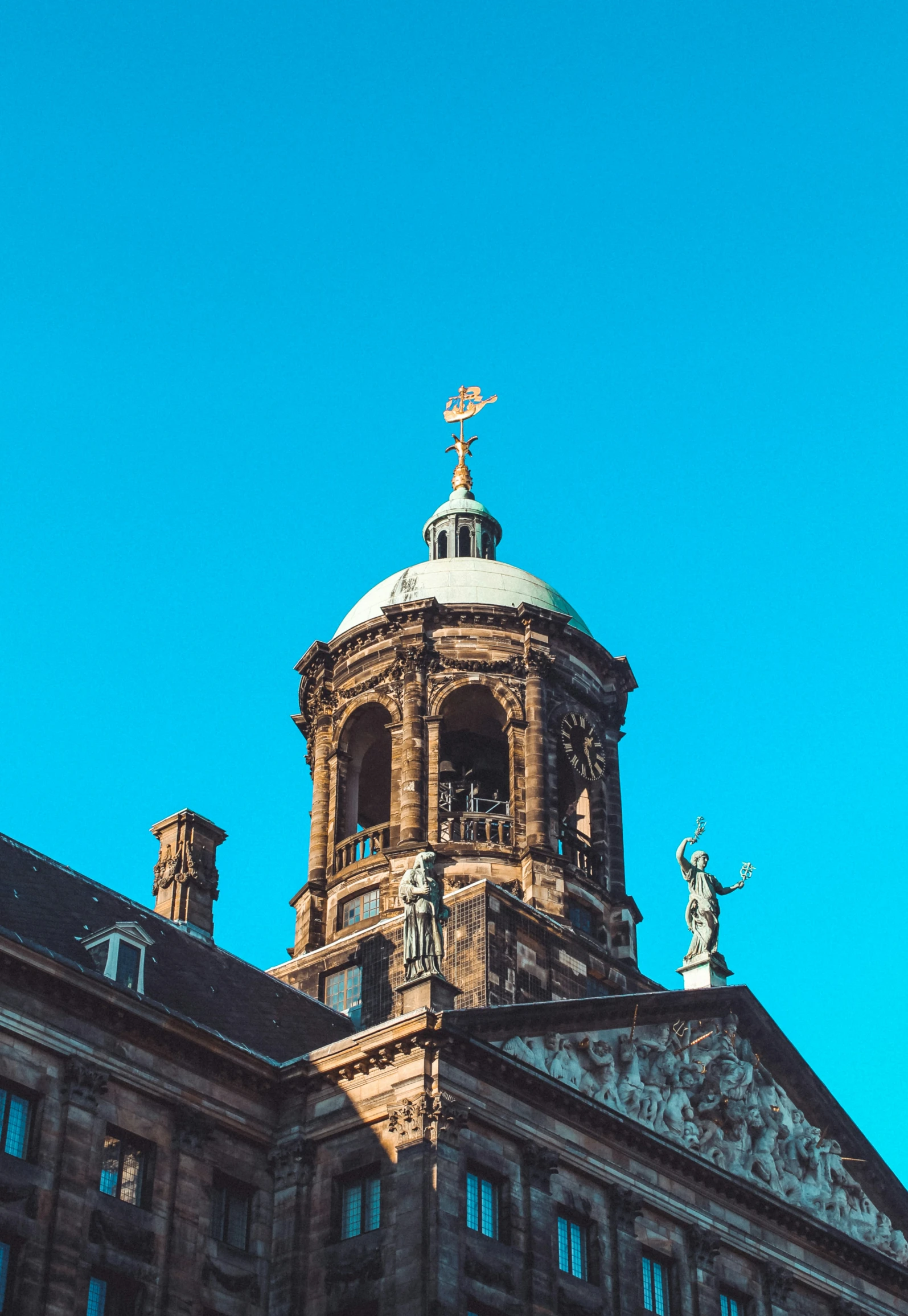 an old building with a tower and dome