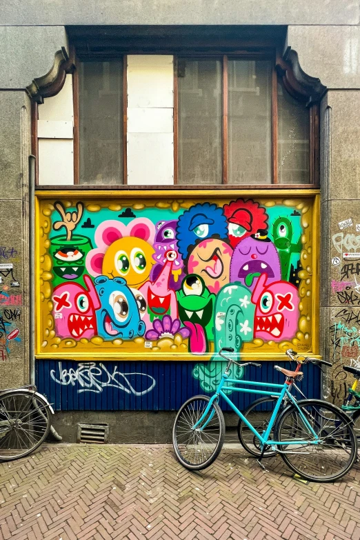 colorful art with cartoon characters on a street wall