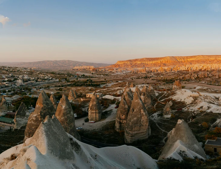 view of a valley with mountains and rocky terrain