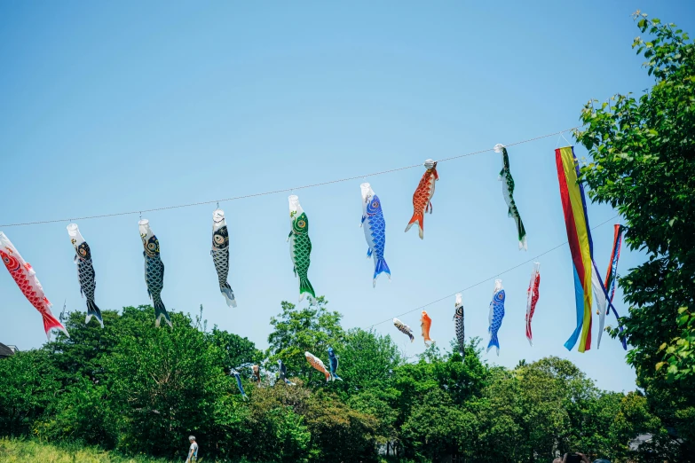 several different colored streamers hanging from a line
