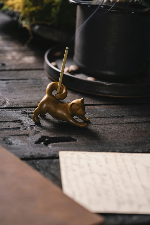 an open pen is on the table with some writing