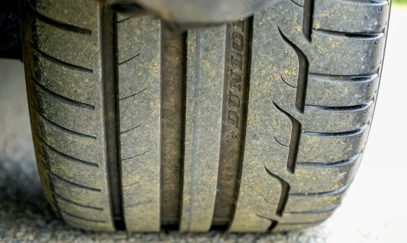 closeup of an old car tire on the street