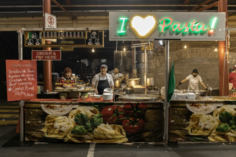 a restaurant with many different foods on display in it