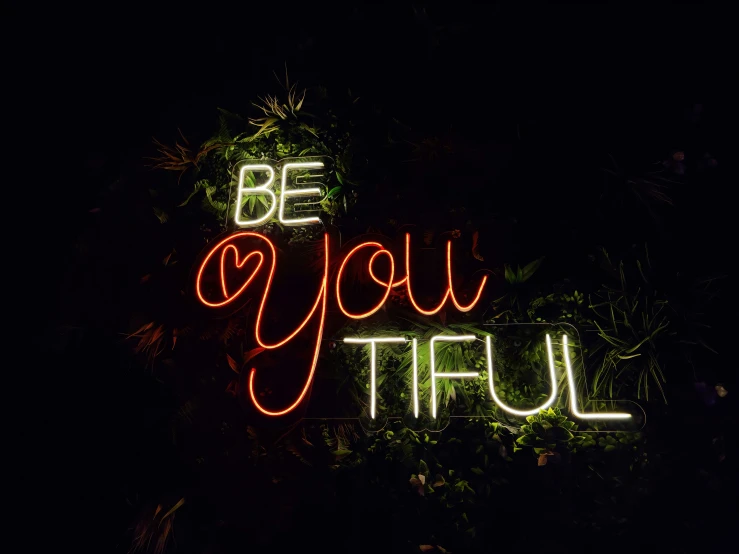 a sign that reads be you tiful