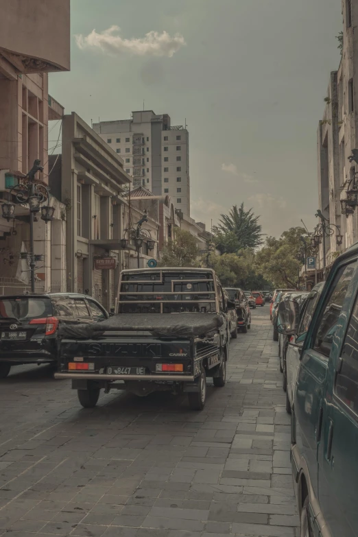 a truck with some kind of bed sitting on the street