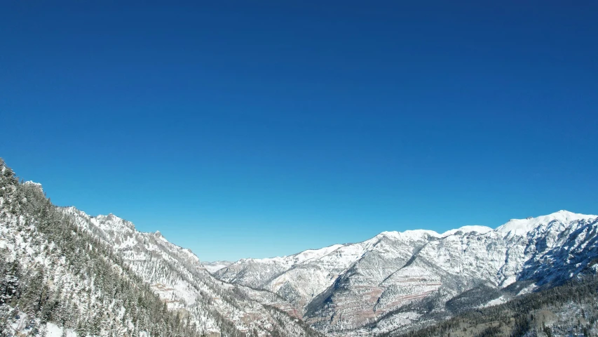 a very tall mountain covered in snow