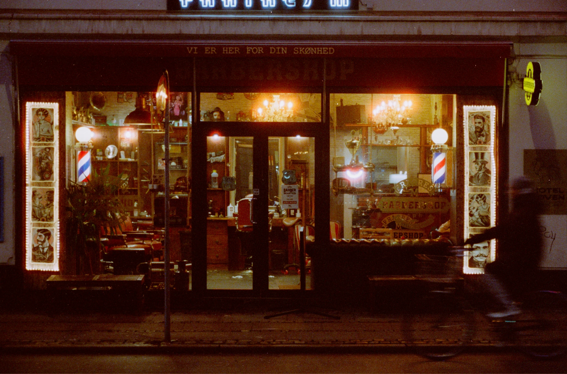 the front door of a store on a busy street