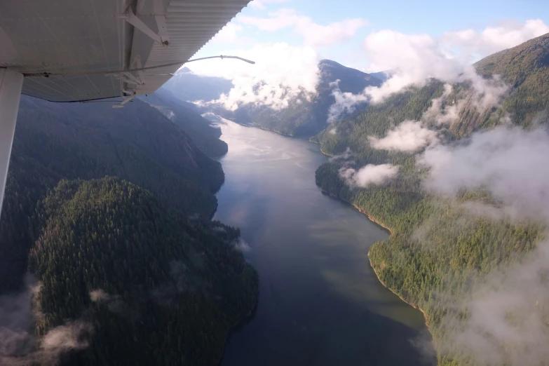 the view from an airplane looking down over a body of water