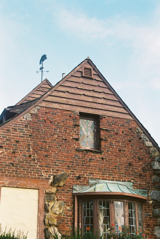 a building with an open window on the outside of it