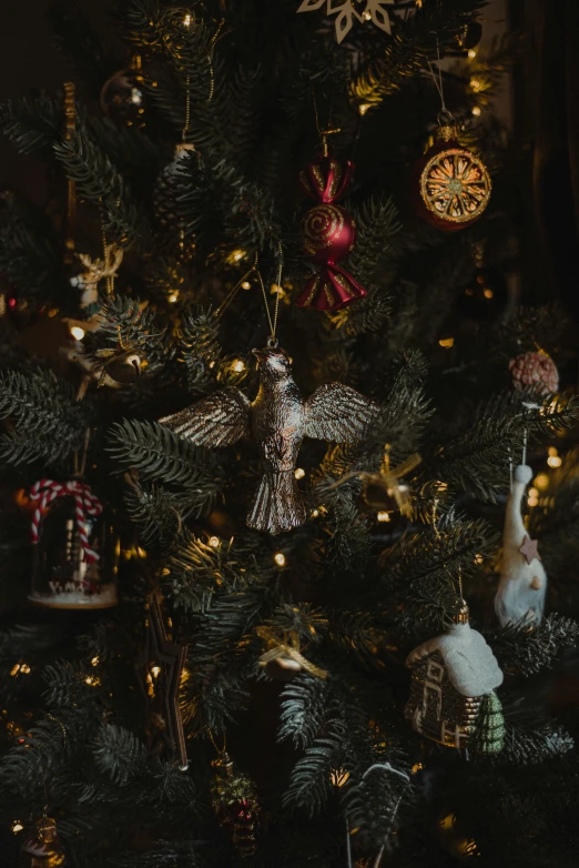 a picture of an ornament tree in the dark