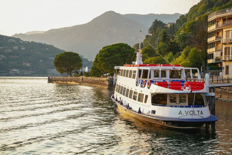 a large boat is docked in the bay