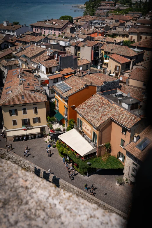 an aerial view of the town of pescata with lots of windows and roof tiles