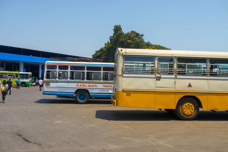 a group of buses parked next to each other