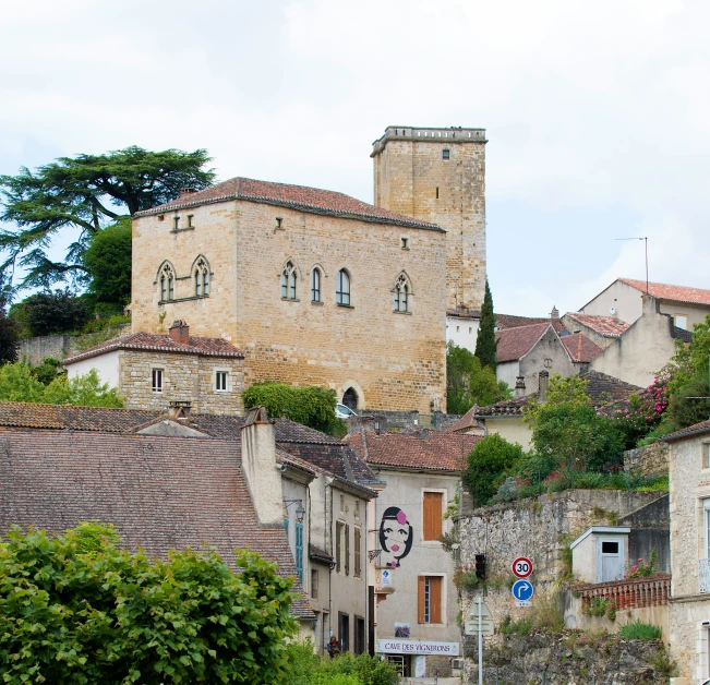 an old city is surrounded by stone buildings