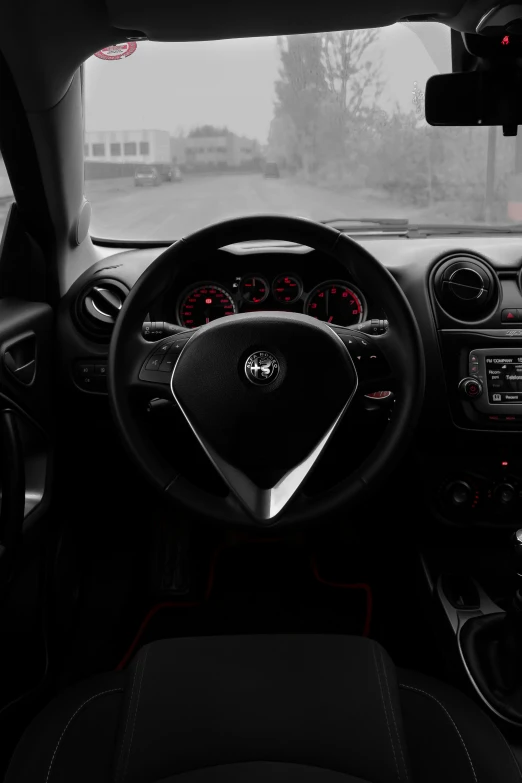 a view from inside of a car with dash lights and steering wheel