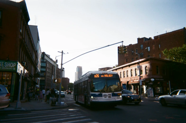 a bus is traveling down a busy street