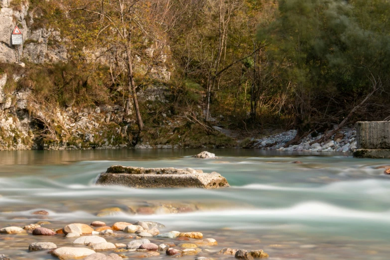 the water is moving fast in the rocky river