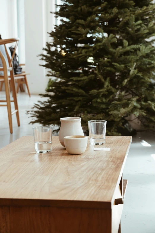 a table with several glasses sitting on top